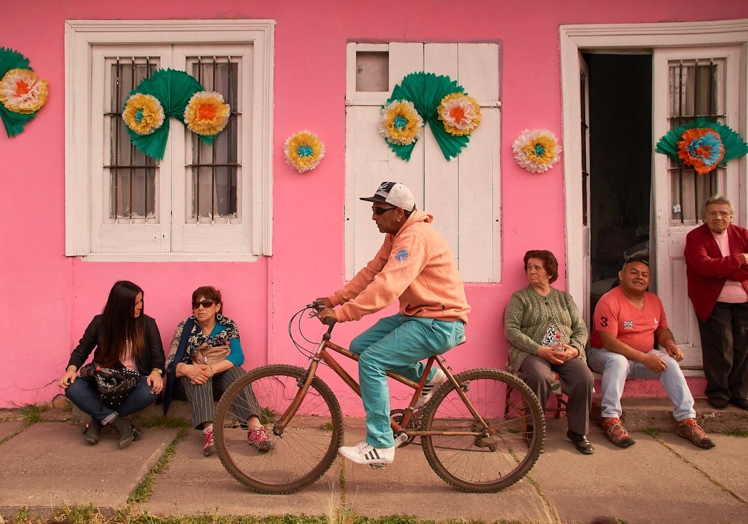 Diverse group of Chilean community members attending a photography workshop